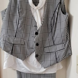 Three piece black and white checkered board suit